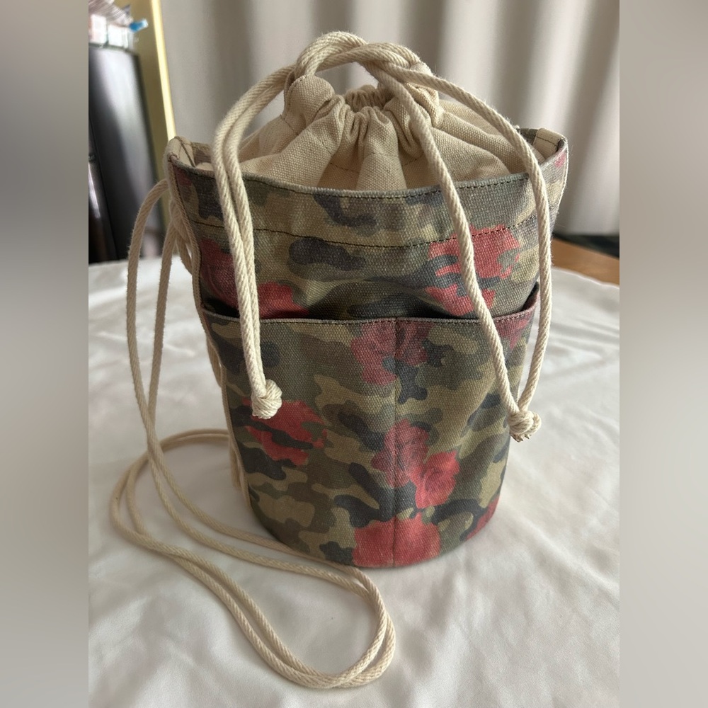 Peace Love World floral camo bucket bag